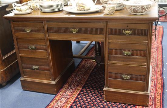 An Edwardian walnut dressing table (altered) W.130cm